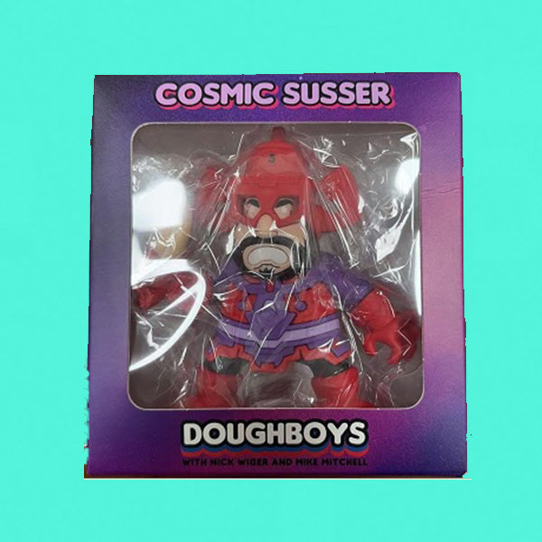 Toy figure in packaging with 'Cosmic Susser' branding on a teal background